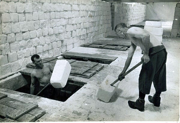 Seddons, lofting salt from drying into storage above. George Twigg © 19. Seddons, lofting salt from drying into storage above.jpg