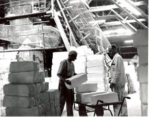 21. Feeding the lump crushing mill 1965-6. The salt is crushed up ready to be bagged up. Murgatroyd's.jpg
